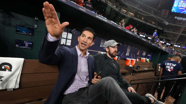Mike Hazen in dugout before World Series Game 2 in Arlington Texas